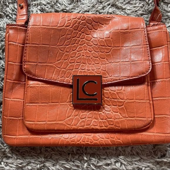 Liz Claiborne VINTAGE orange pleather purse animal print Clean lots of pockets - Picture 3 of 8